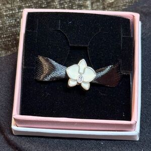 Authentic Retired Pandora white orchid charm